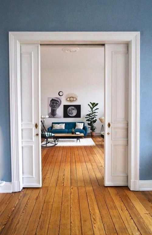 White painted frameless wood pocket interior door